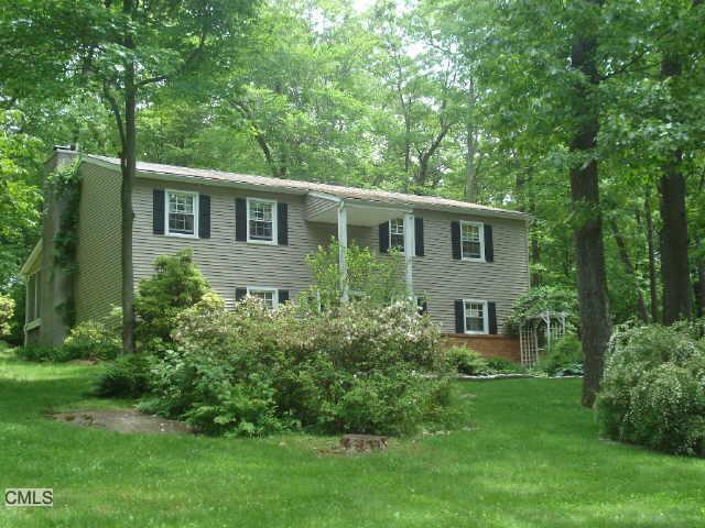 27 Deer Run Road Brookfield, CT 06804 - Photo 1 of 1 a view of a house with a yard and plants