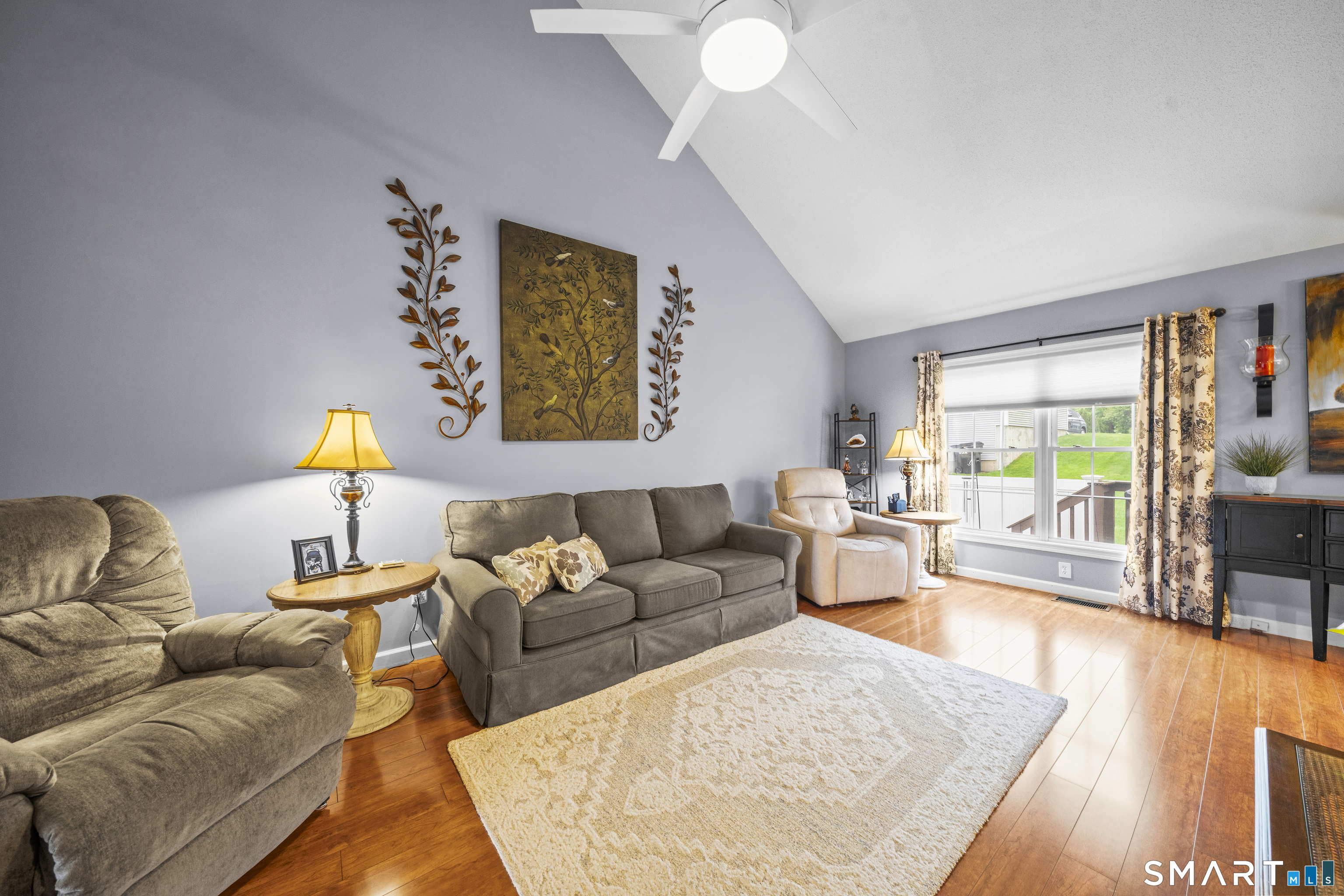 7 Heather Lane, Unit 7 Suffield, CT 06078 - Photo 5 of 34 a living room with furniture and a large window