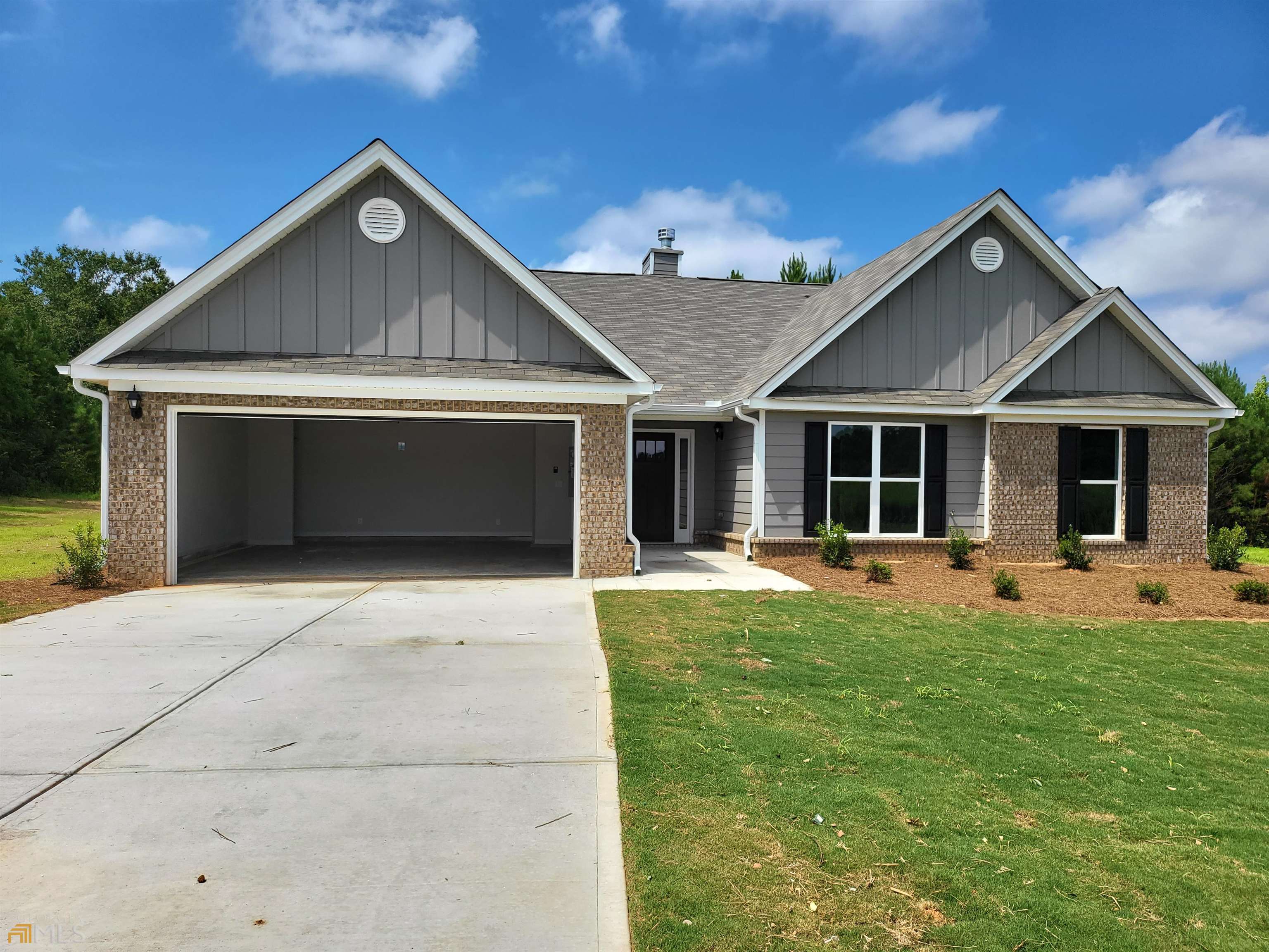 4350 Jacks Creek Road Northwest, Unit 1 Monroe, GA 30655 - Photo 1 of 1 a front view of a house with a yard and porch