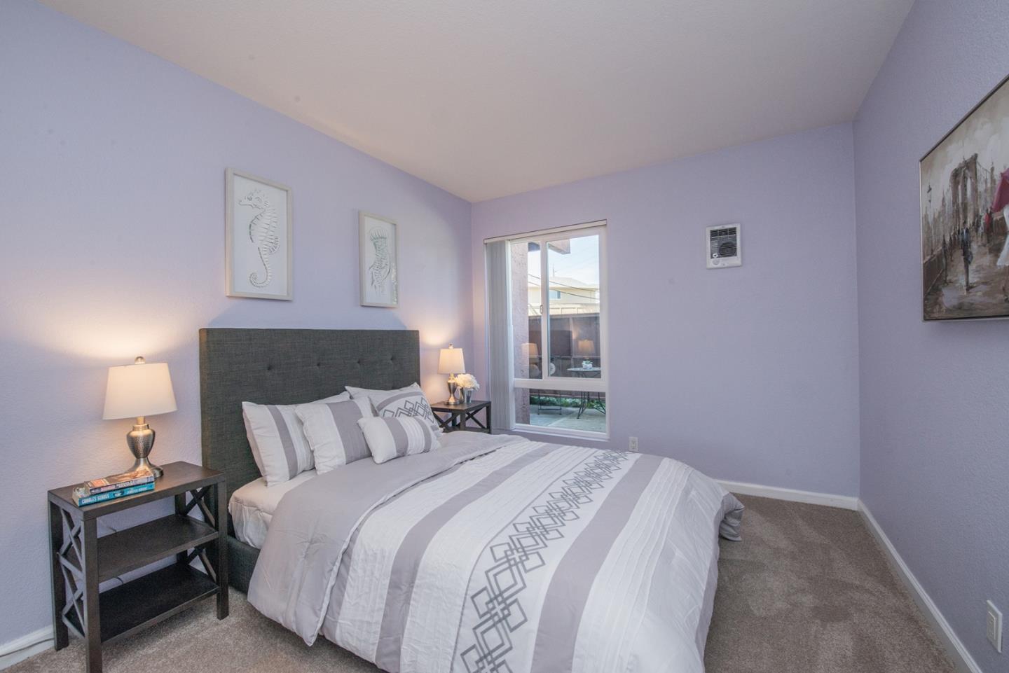 492 Dempsey Road, Unit 193 Milpitas, CA 95035 - Photo 11 of 35 a bedroom with a bed and night stand