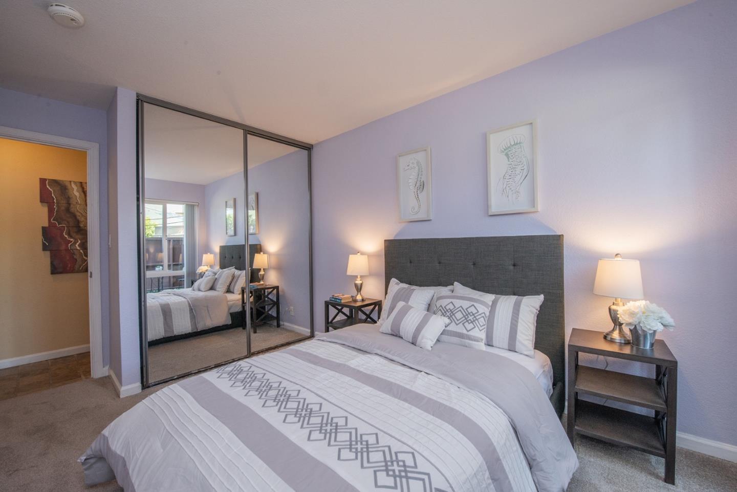 492 Dempsey Road, Unit 193 Milpitas, CA 95035 - Photo 12 of 35 a bedroom with a bed and a couch