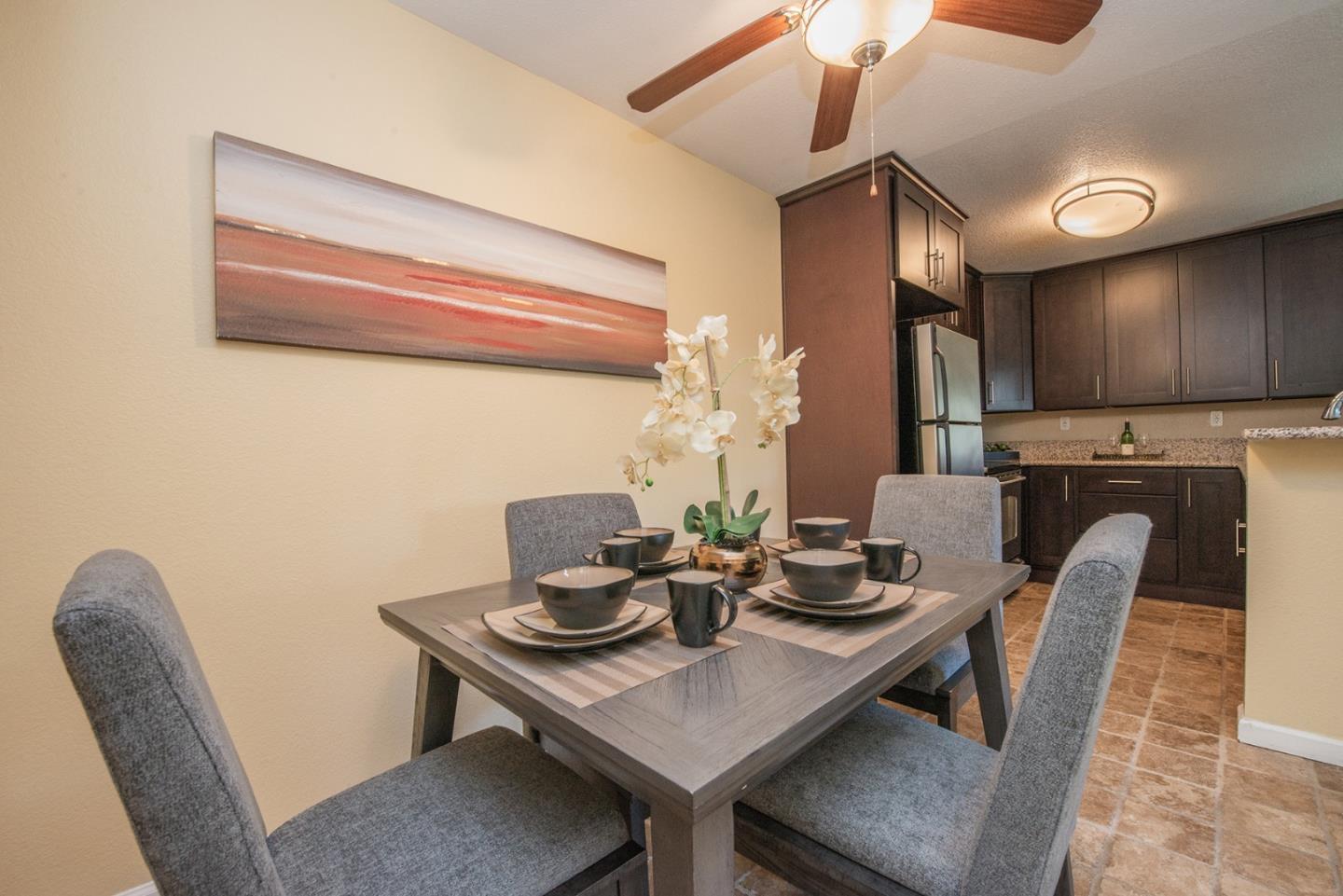 492 Dempsey Road, Unit 193 Milpitas, CA 95035 - Photo 14 of 35 a kitchen with a table and chairs in it