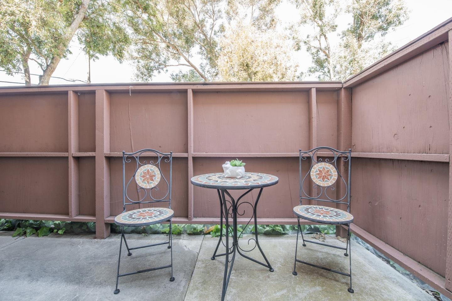 492 Dempsey Road, Unit 193 Milpitas, CA 95035 - Photo 18 of 35 a backyard of a house with table and chairs