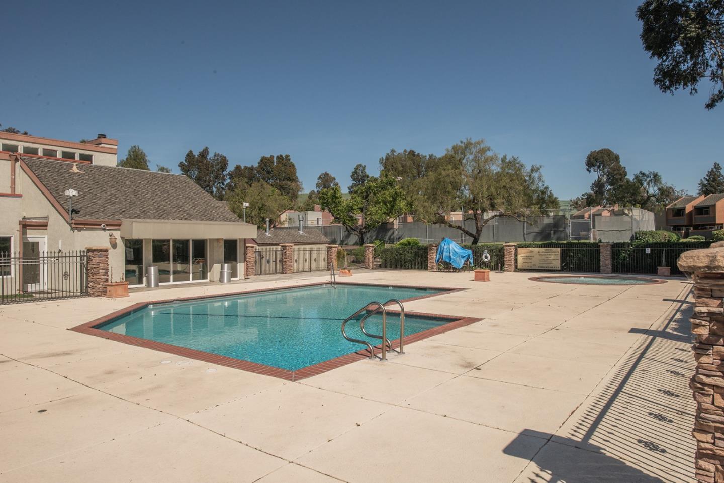 492 Dempsey Road, Unit 193 Milpitas, CA 95035 - Photo 27 of 35 a view of a house with swimming pool