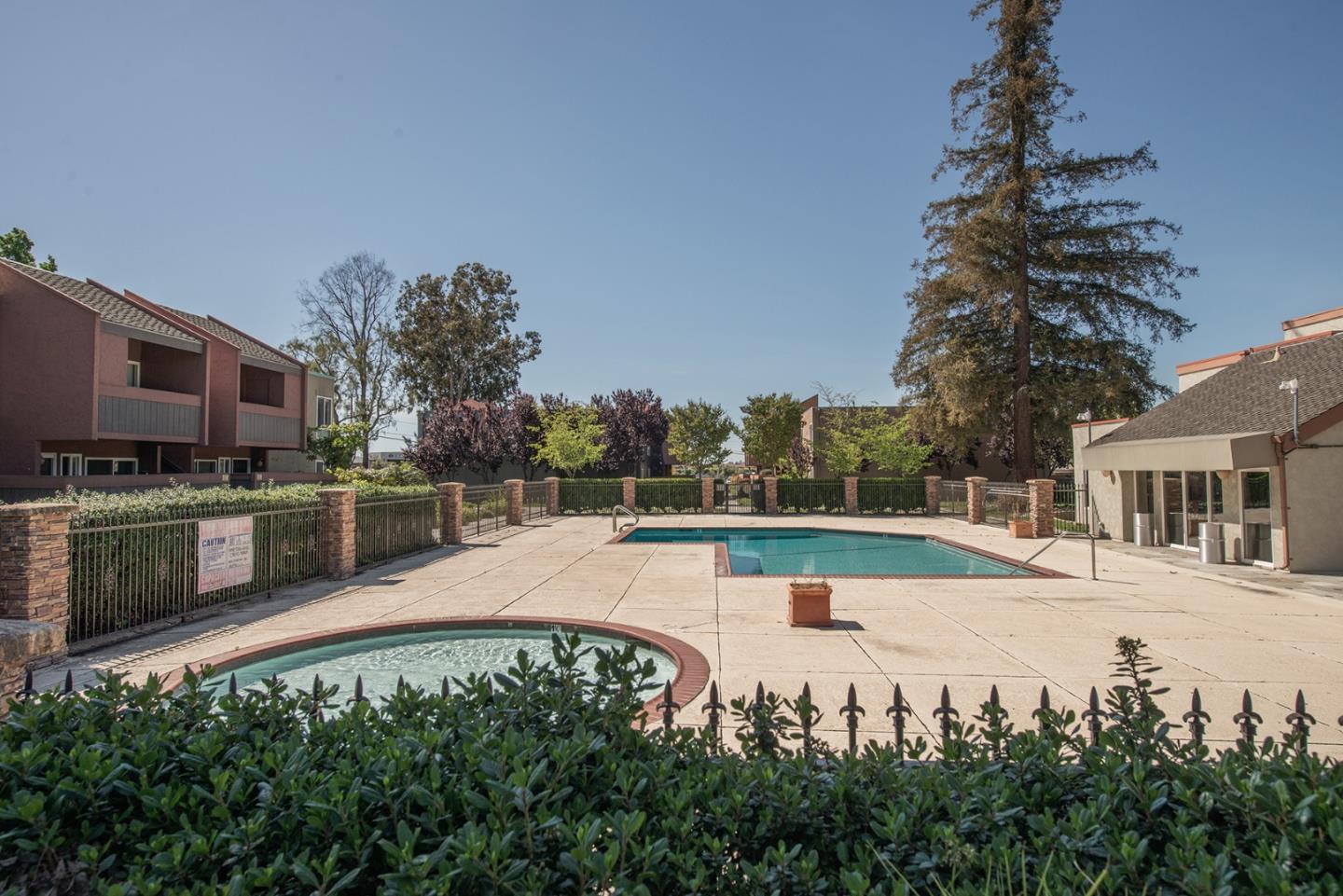 492 Dempsey Road, Unit 193 Milpitas, CA 95035 - Photo 28 of 35 a view of a house with a swimming pool