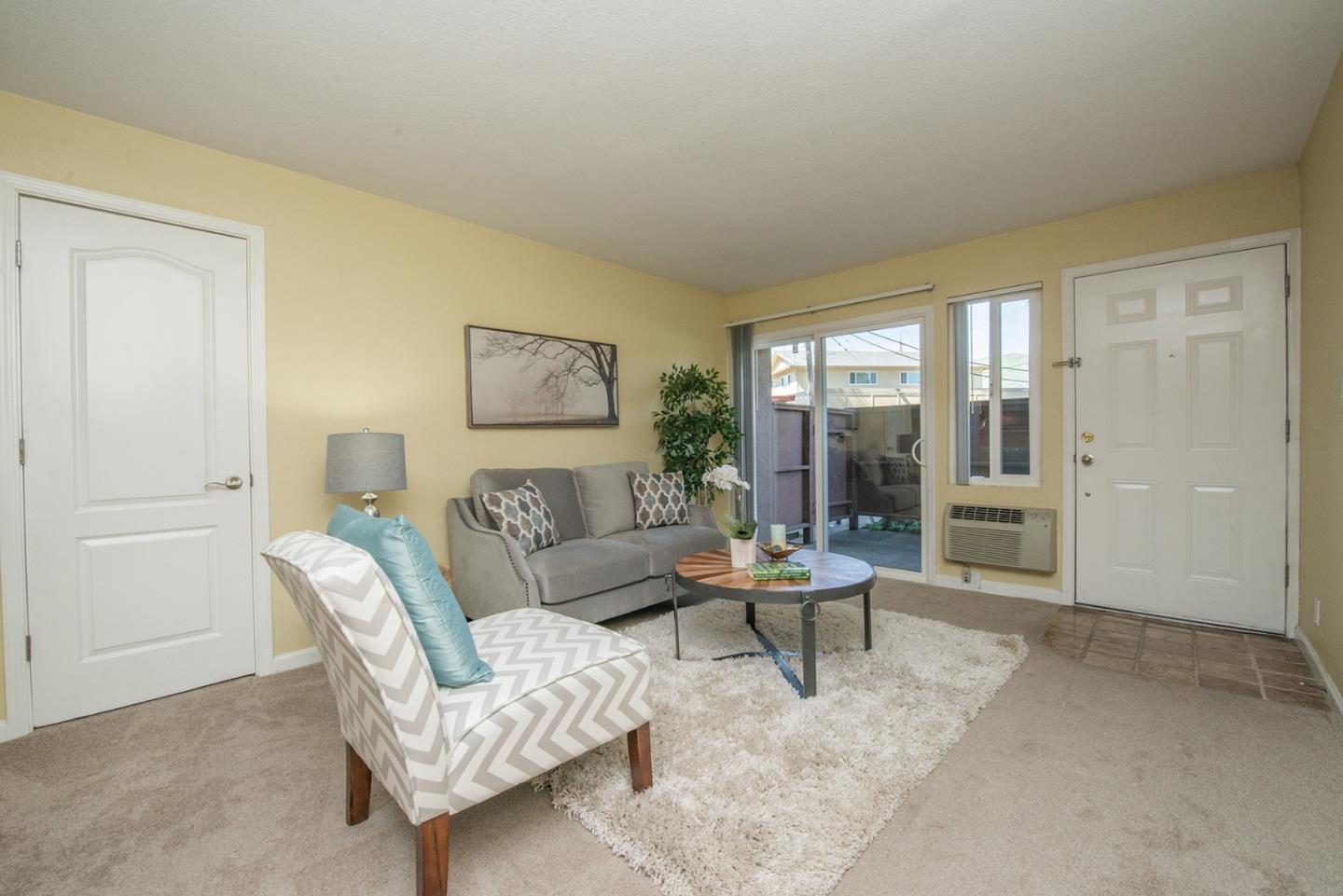 492 Dempsey Road, Unit 193 Milpitas, CA 95035 - Photo 3 of 35 a living room with furniture and a table