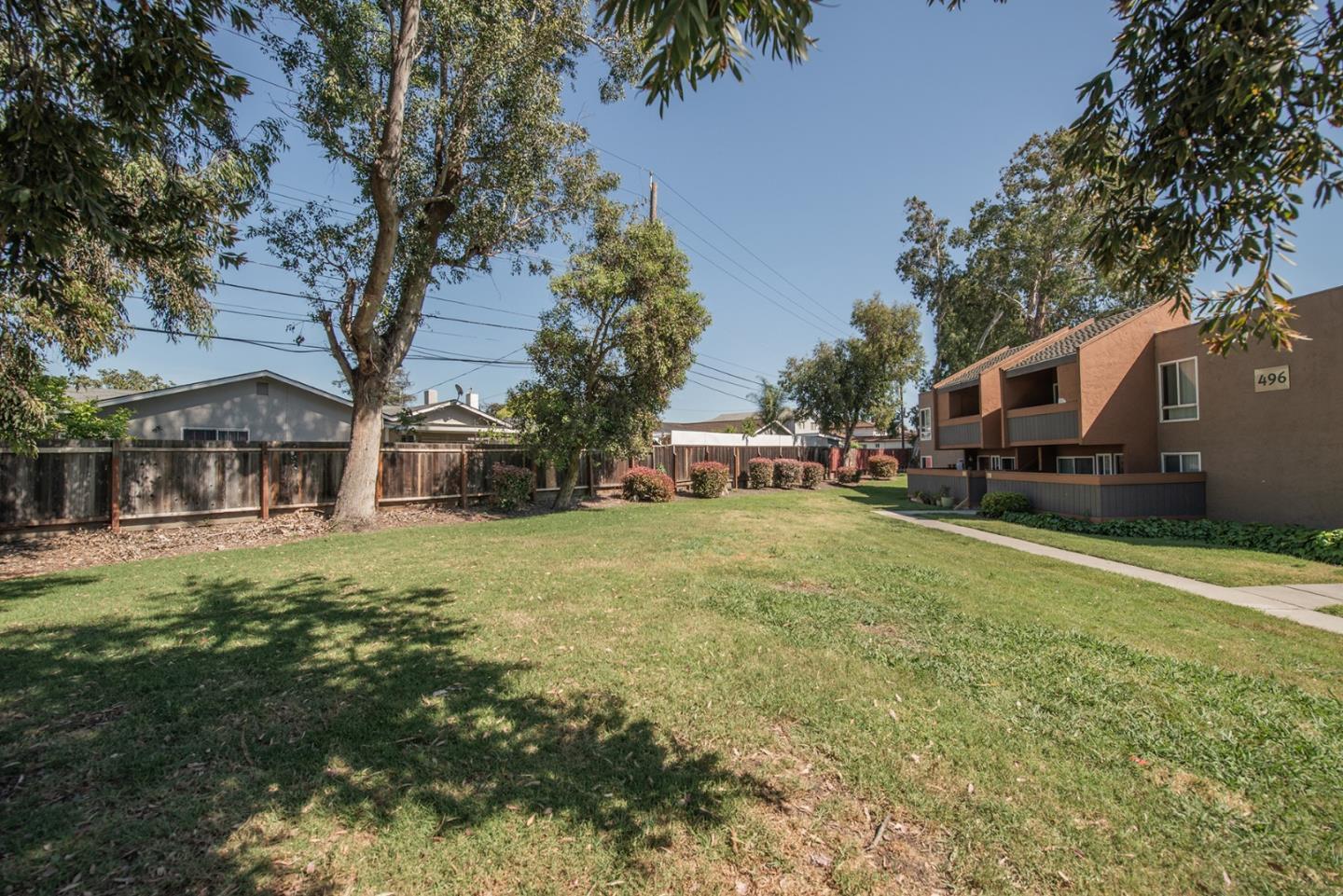 492 Dempsey Road, Unit 193 Milpitas, CA 95035 - Photo 32 of 35 a front view of a house with a garden