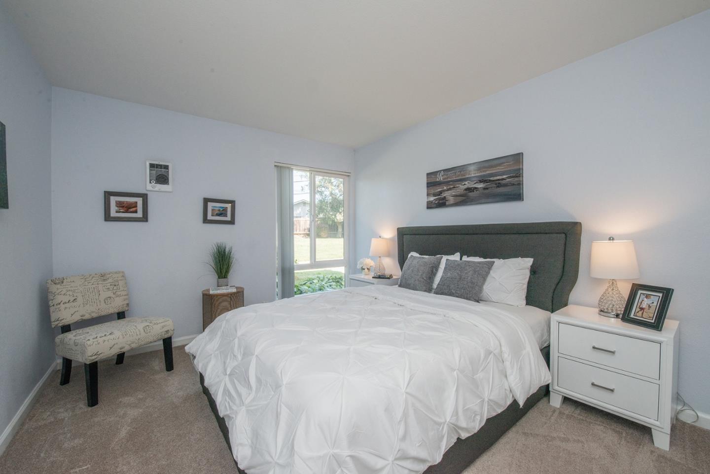 492 Dempsey Road, Unit 193 Milpitas, CA 95035 - Photo 8 of 35 a bedroom with a bed and a couch