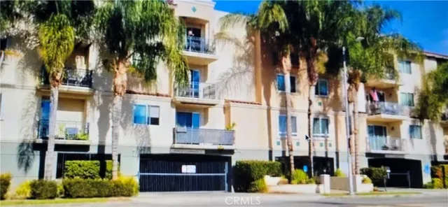 a view of a building with a street
