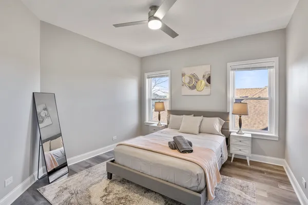 a room with a bed and a window