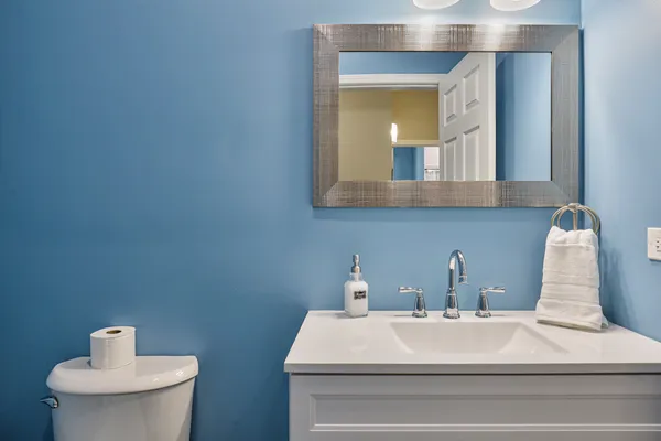 a bathroom with a sink and a toilet
