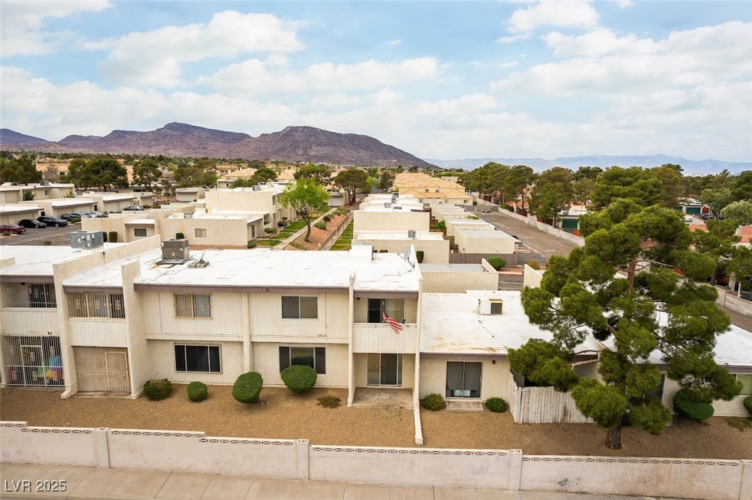 555 Rene Lane Henderson, NV 89015 - Photo 24 of 28 View of property featuring a mountain view, fence, and a residential view