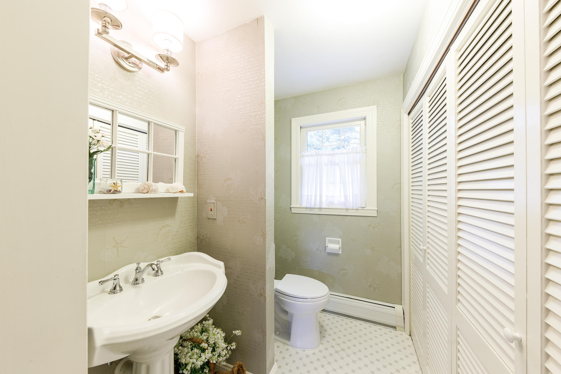 53 Partridge Path Chatham, MA 02633 - Photo 27 of 31 First Floor Laundry with 1/2 Bath