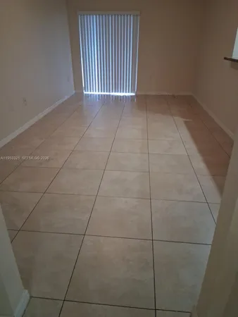 a view of empty room with window