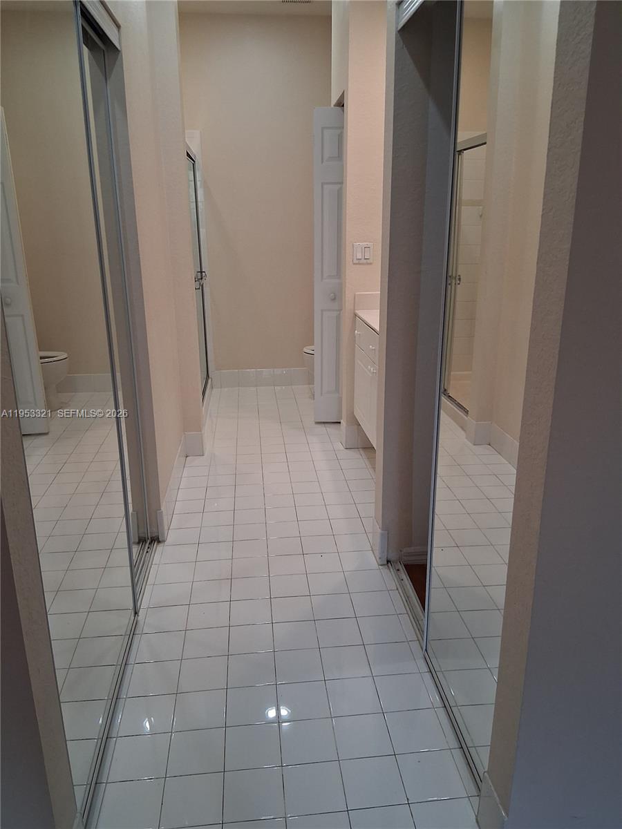 3395 Merrick Court, Unit 1110 Margate, FL 33063 - Photo 9 of 16 a view of a hallway