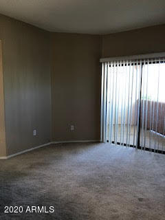10030 West Indian School Road, Unit 241 Phoenix, AZ 85037 - Photo 2 of 12 LIVING ROOM 2