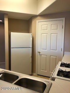 10030 West Indian School Road, Unit 241 Phoenix, AZ 85037 - Photo 3 of 12 KITCHEN 1