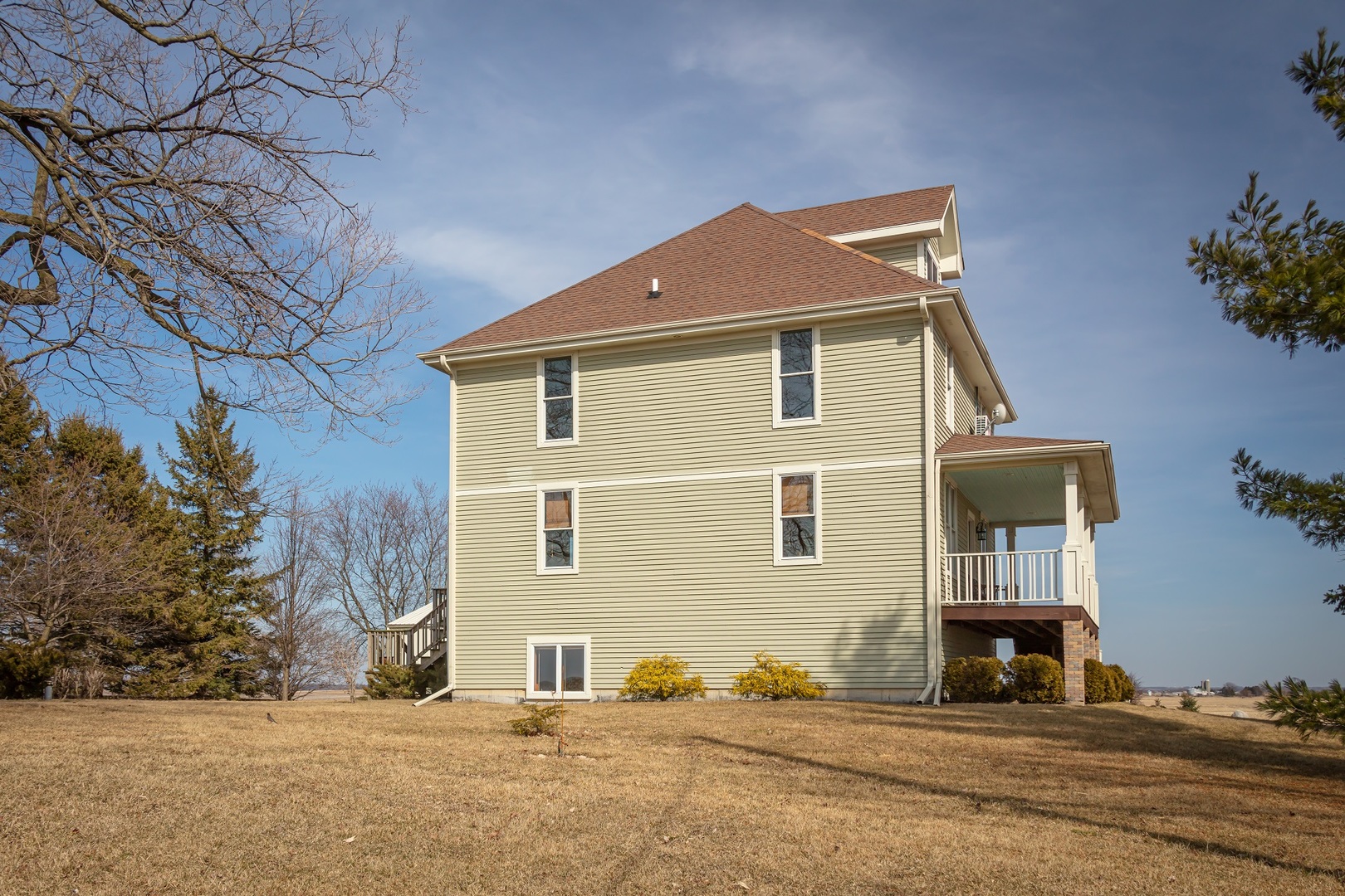 24964 Henderson Road Sycamore, IL 60178 - Photo 4 of 93 a front view of a house with a yard