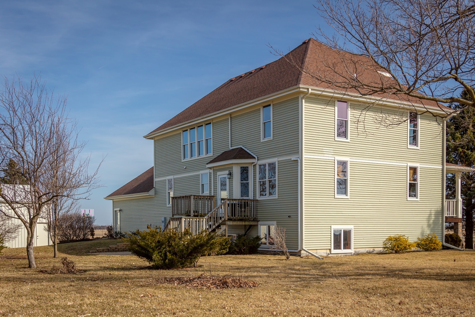 24964 Henderson Road Sycamore, IL 60178 - Photo 5 of 93 a front view of a house with a yard