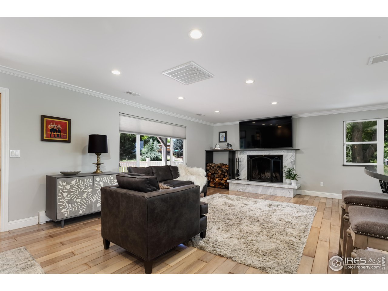 5825 Rustic Knolls Drive Boulder, CO 80301 - Photo 40 of 40 a living room with furniture and a flat screen tv