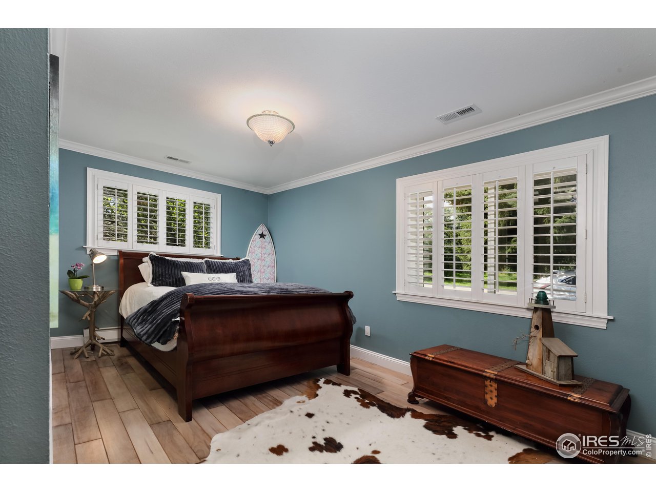 5825 Rustic Knolls Drive Boulder, CO 80301 - Photo 13 of 40 a living room with furniture window and wooden floor