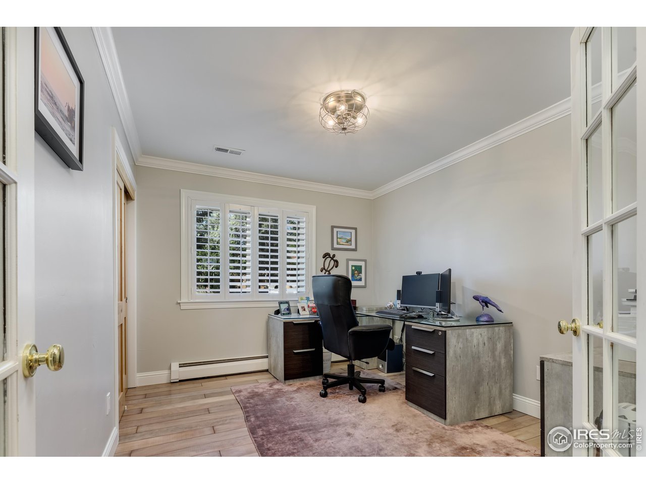 5825 Rustic Knolls Drive Boulder, CO 80301 - Photo 15 of 40 a workspace with furniture and a window