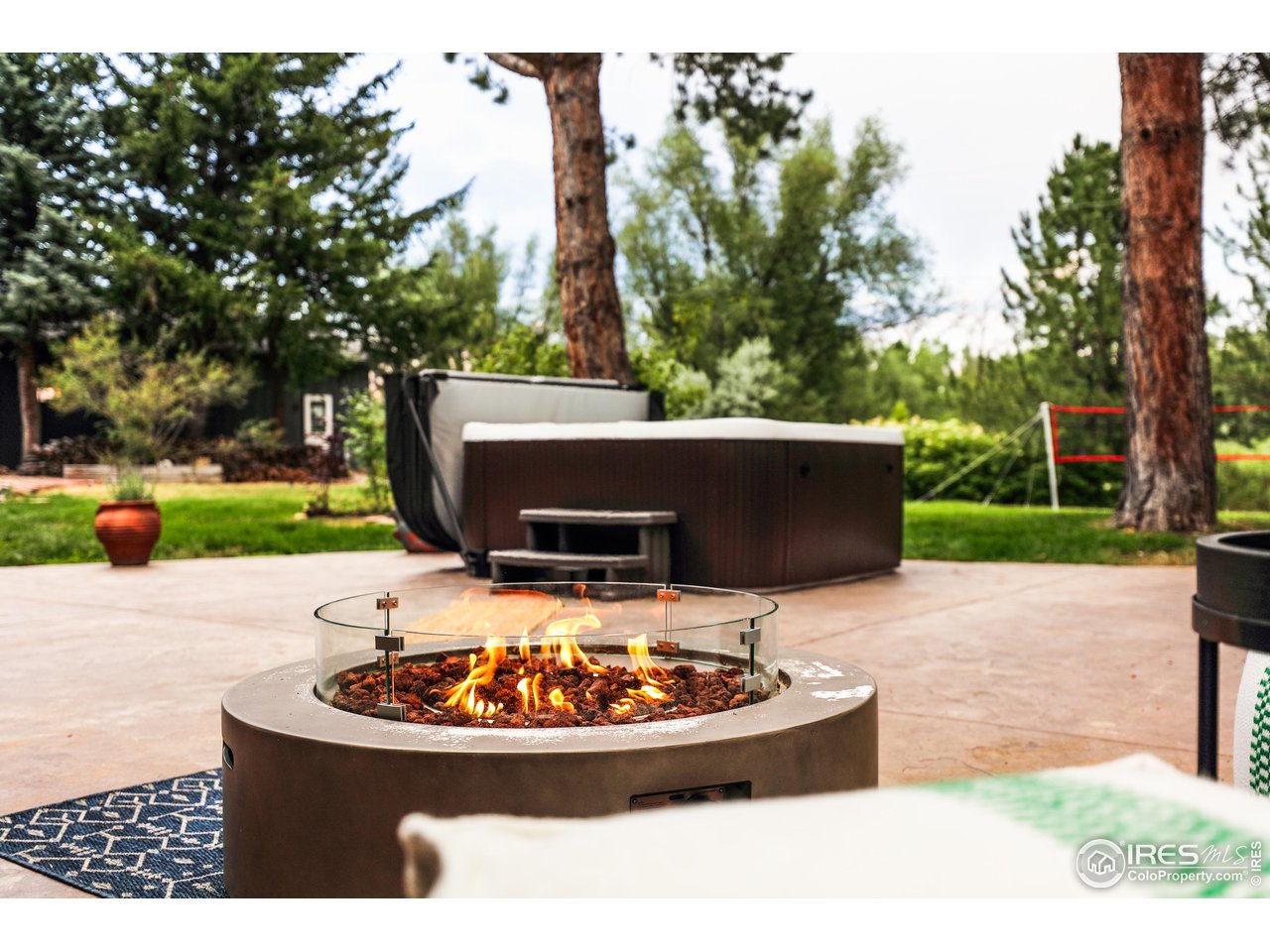 5825 Rustic Knolls Drive Boulder, CO 80301 - Photo 2 of 40 a view of a backyard with plants and outdoor seating