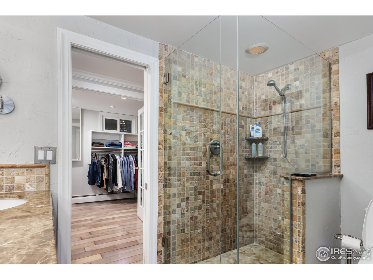 5825 Rustic Knolls Drive Boulder, CO 80301 - Photo 22 of 40 a bathroom with a shower