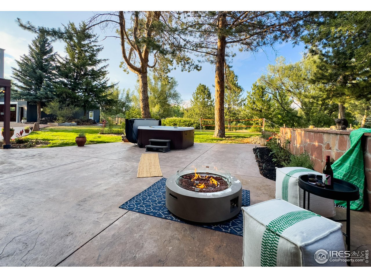 5825 Rustic Knolls Drive Boulder, CO 80301 - Photo 3 of 40 a view of a swimming pool with a patio