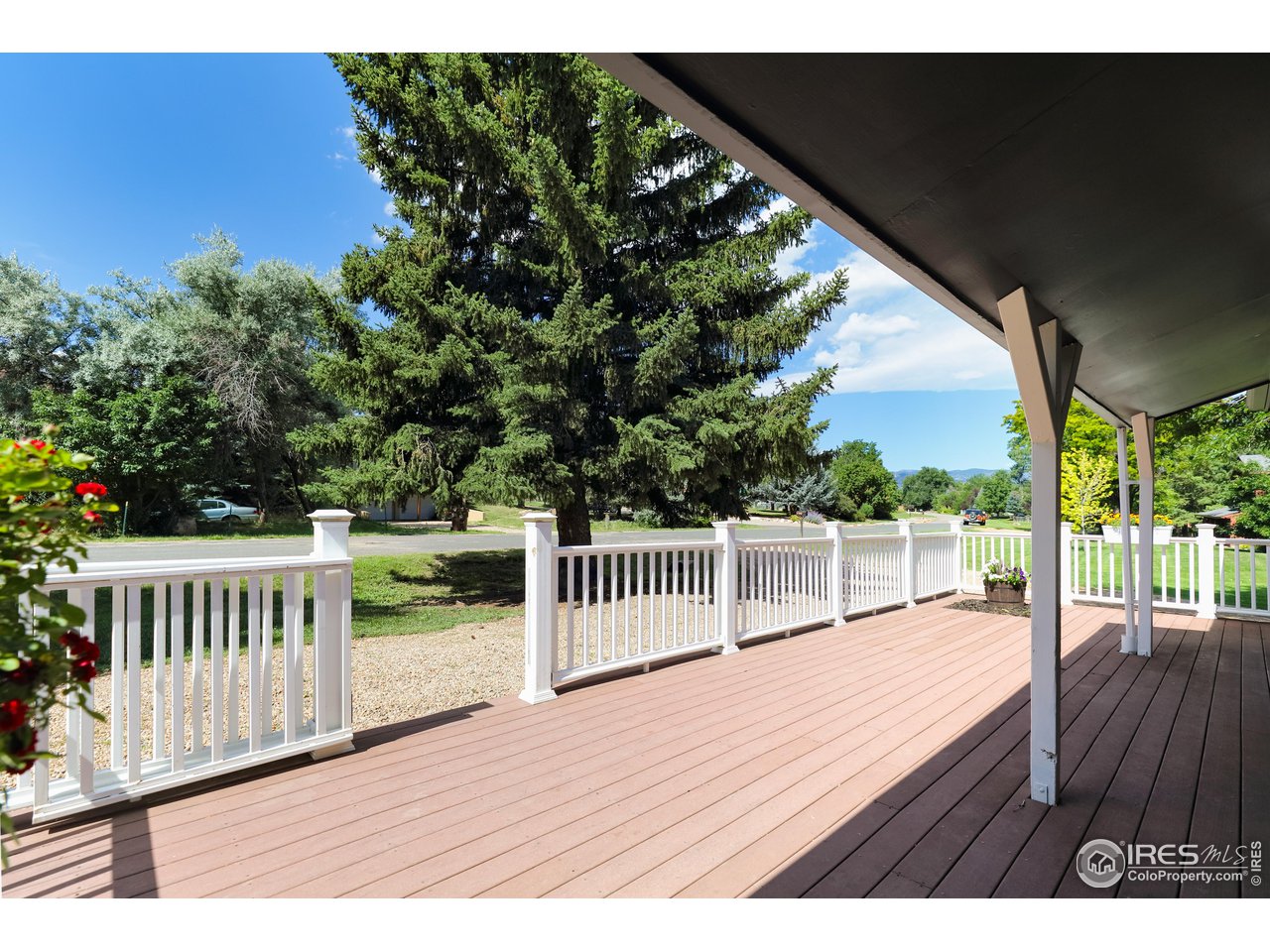 5825 Rustic Knolls Drive Boulder, CO 80301 - Photo 35 of 40 a view of deck with a flat screen tv