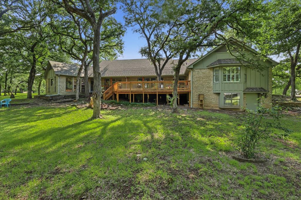 1904 Oak Ridge Trail Bridgeport, TX 76426 - Photo 35 of 40 a view of a house with a big yard
