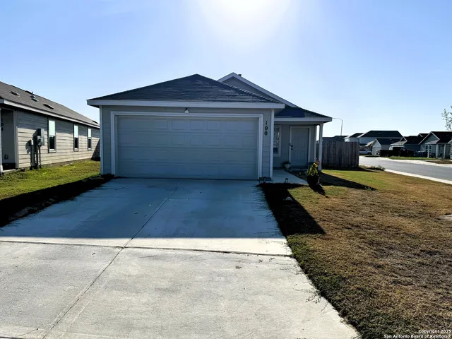 a view of a yard in front of a house