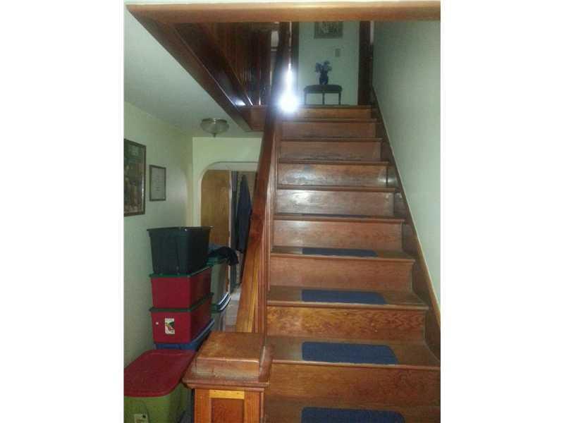142 Portland Road Bridgton, ME 04009 - Photo 6 of 14 Interior Space/Layout. Wood Stairwell