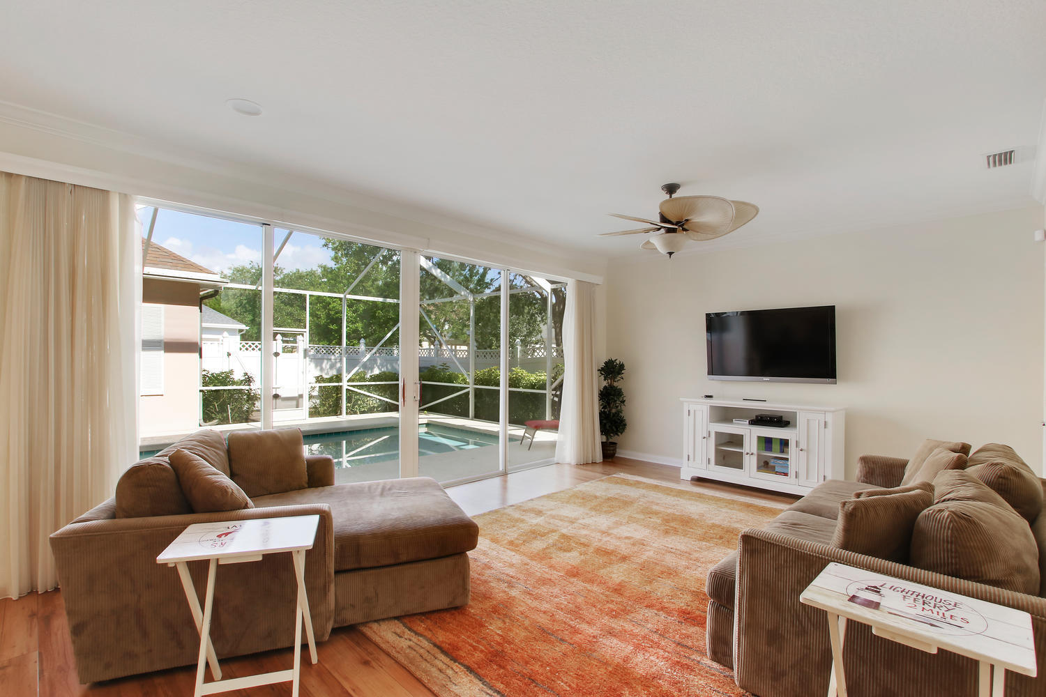 214 New Haven Boulevard Jupiter, FL 33458 - Photo 11 of 30 Living Room with Pool View