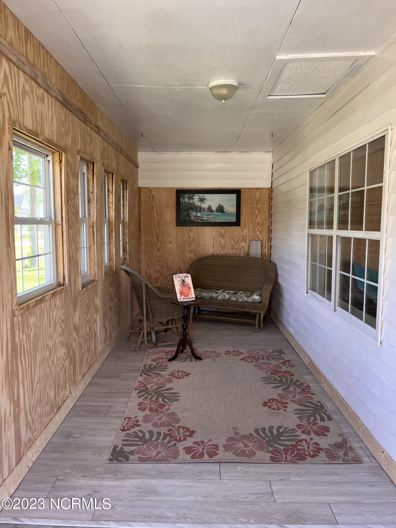 141 Black Duck Road Davis, NC 28524 - Photo 15 of 36 141 Black Duck Enclosed Porch