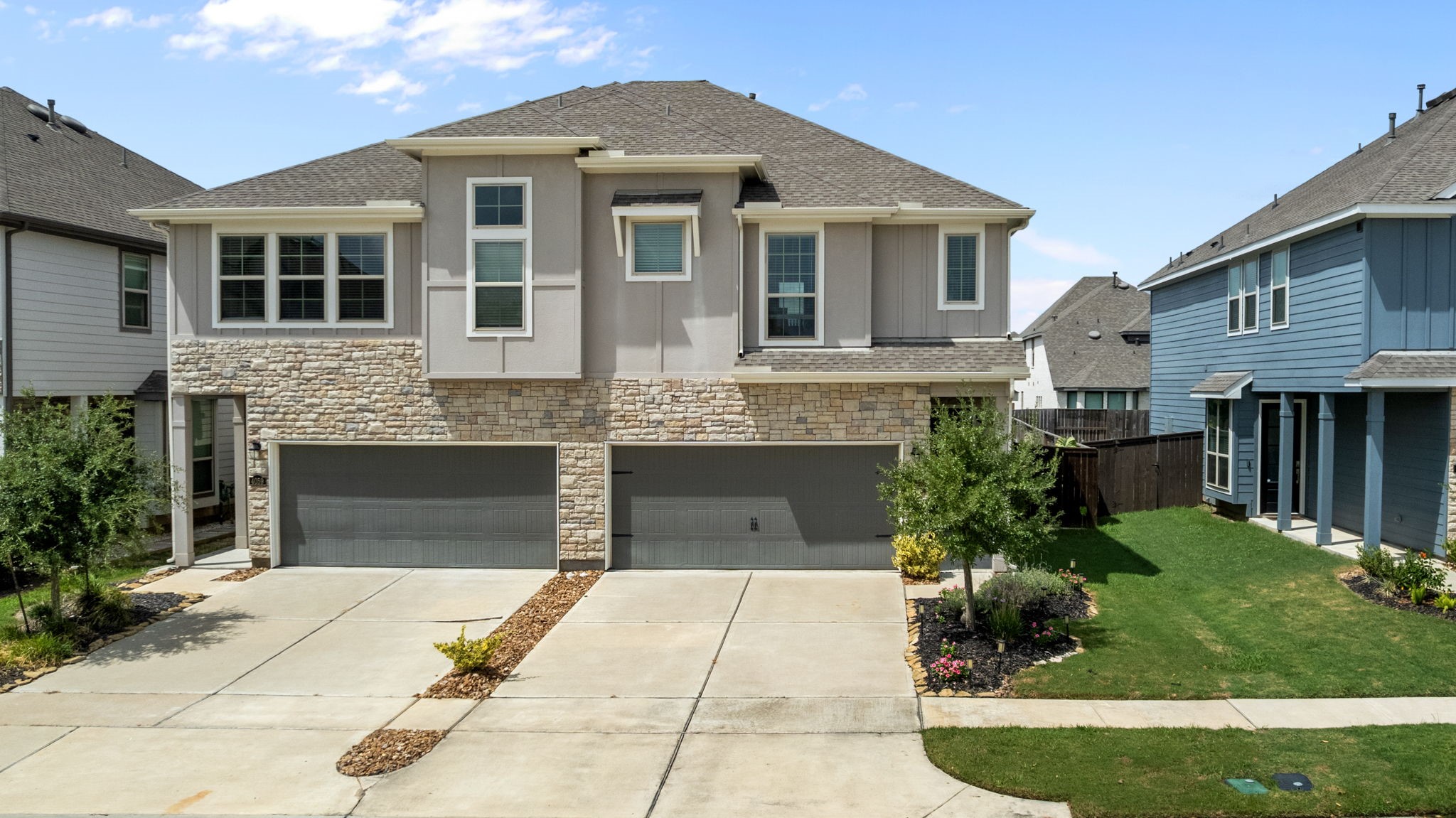 4063 Champlain Way Iowa Colony, TX 77583 - Photo 2 of 45 Gorgeous Stone Elevation