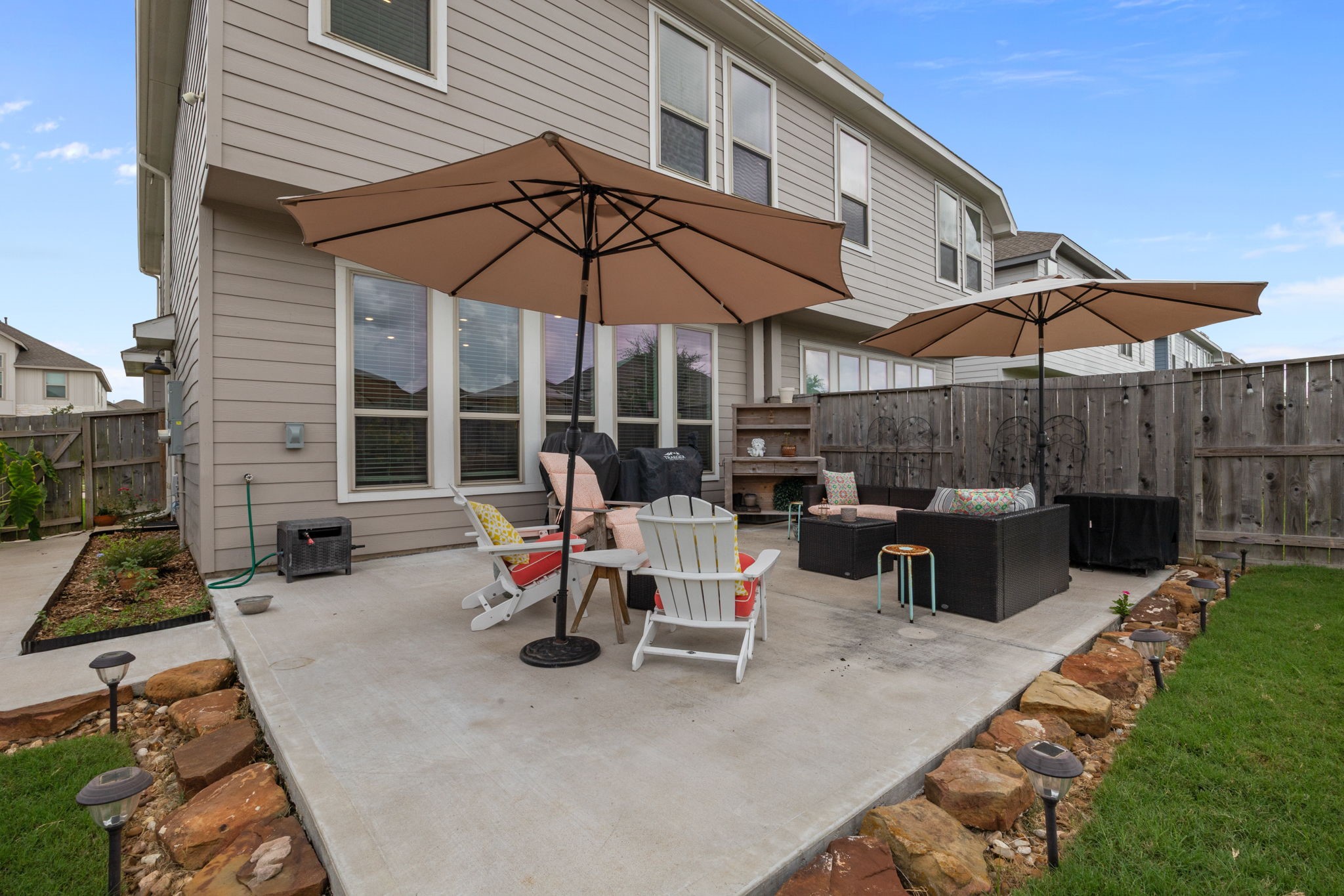 4063 Champlain Way Iowa Colony, TX 77583 - Photo 30 of 45 Sellers added the massive concrete patio and gorgeous landscaping