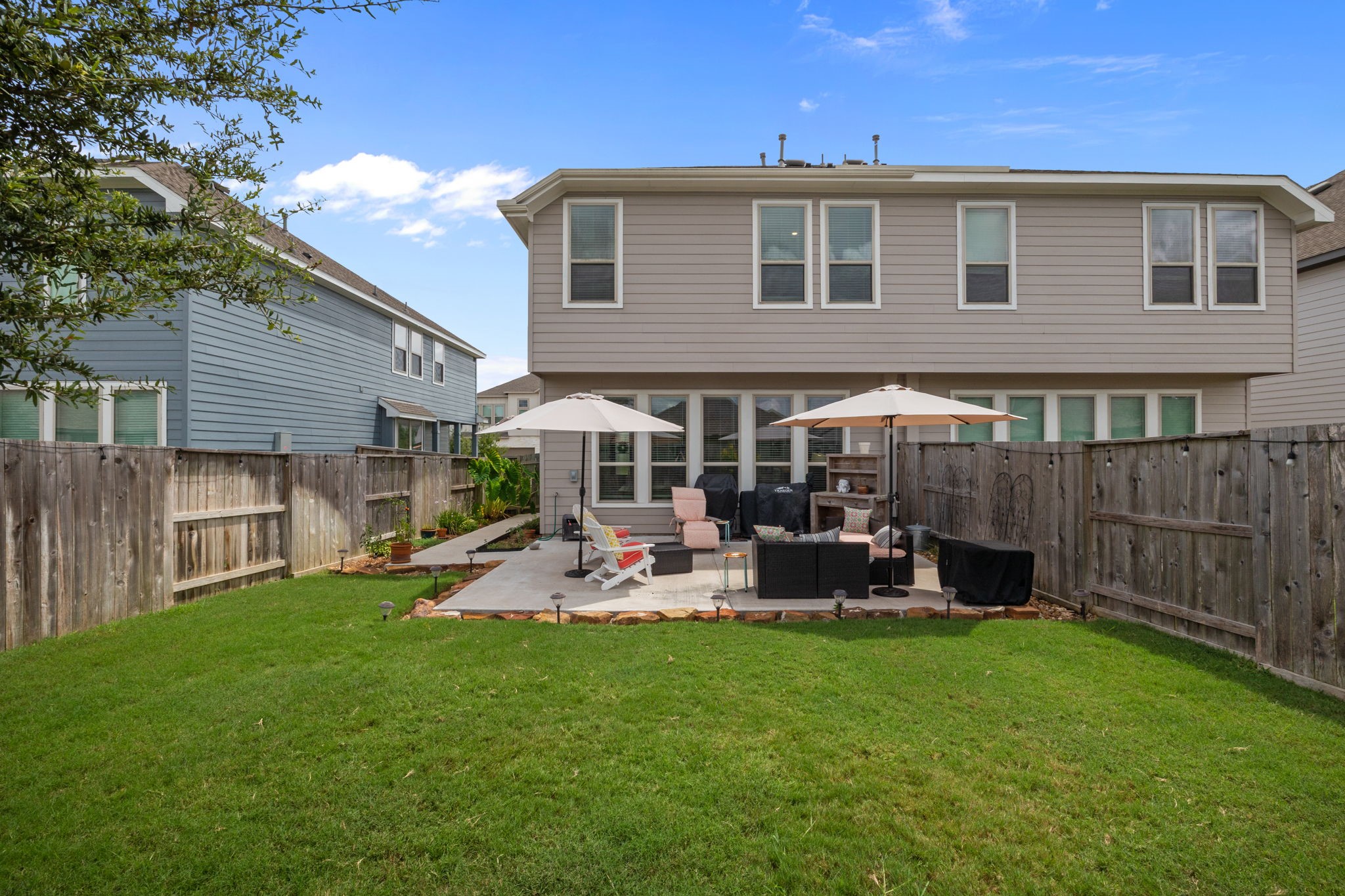 4063 Champlain Way Iowa Colony, TX 77583 - Photo 32 of 45 Look at how large this yard is and is beautifully landscaped!