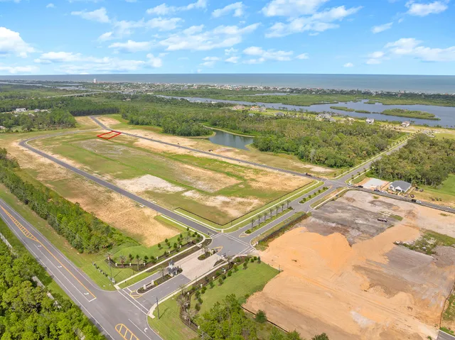 a view of a swimming pool with a yard