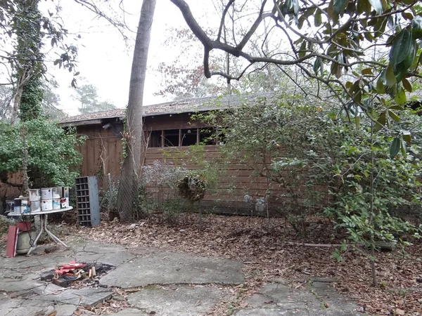 a backyard of a house with lots of green space
