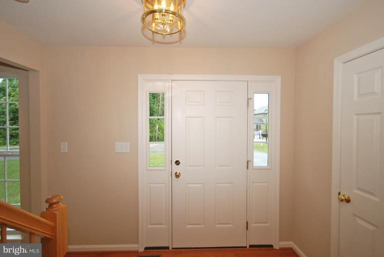 5946 Florey Road Hanover, MD 21076 - Photo 5 of 27 an empty room with windows