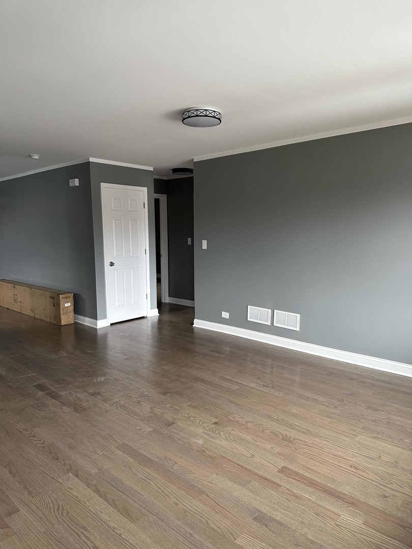 1815 171st Street Hazel Crest, IL 60429 - Photo 4 of 18 a view of a livingroom with wooden floor