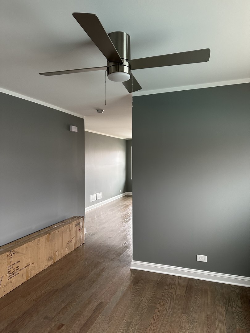 1815 171st Street Hazel Crest, IL 60429 - Photo 6 of 18 a view of an empty room with wooden floor