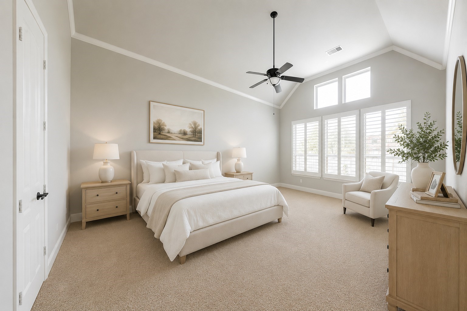 5803 Mustang Ridge Lane Fulshear, TX 77441 - Photo 14 of 50 Private primary suite features soaring ceilings with crown molding, plantation shutters and a wall of windows that fills the room with soft natural light. The spacious layout creates a peaceful retreat with plenty of room for a sitting area.