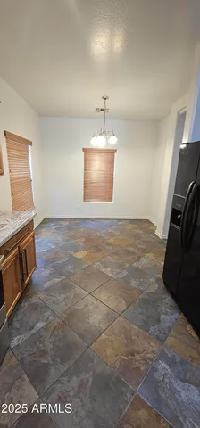 a view of a kitchen with a sink