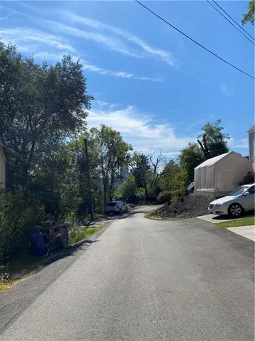 a view of a street with houses