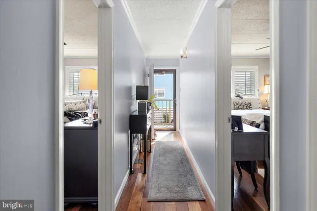 a view of a kitchen from the hallway