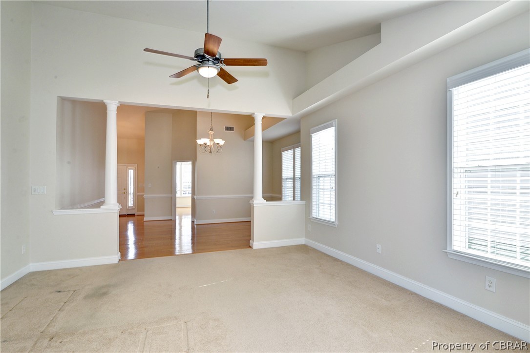 4244 Old Lock Road Williamsburg, VA 23188 - Photo 7 of 31 The great room features a vaulted ceiling and is open to the dining and sun rooms.