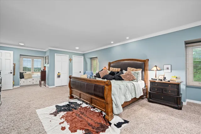 a bed room with bed and window