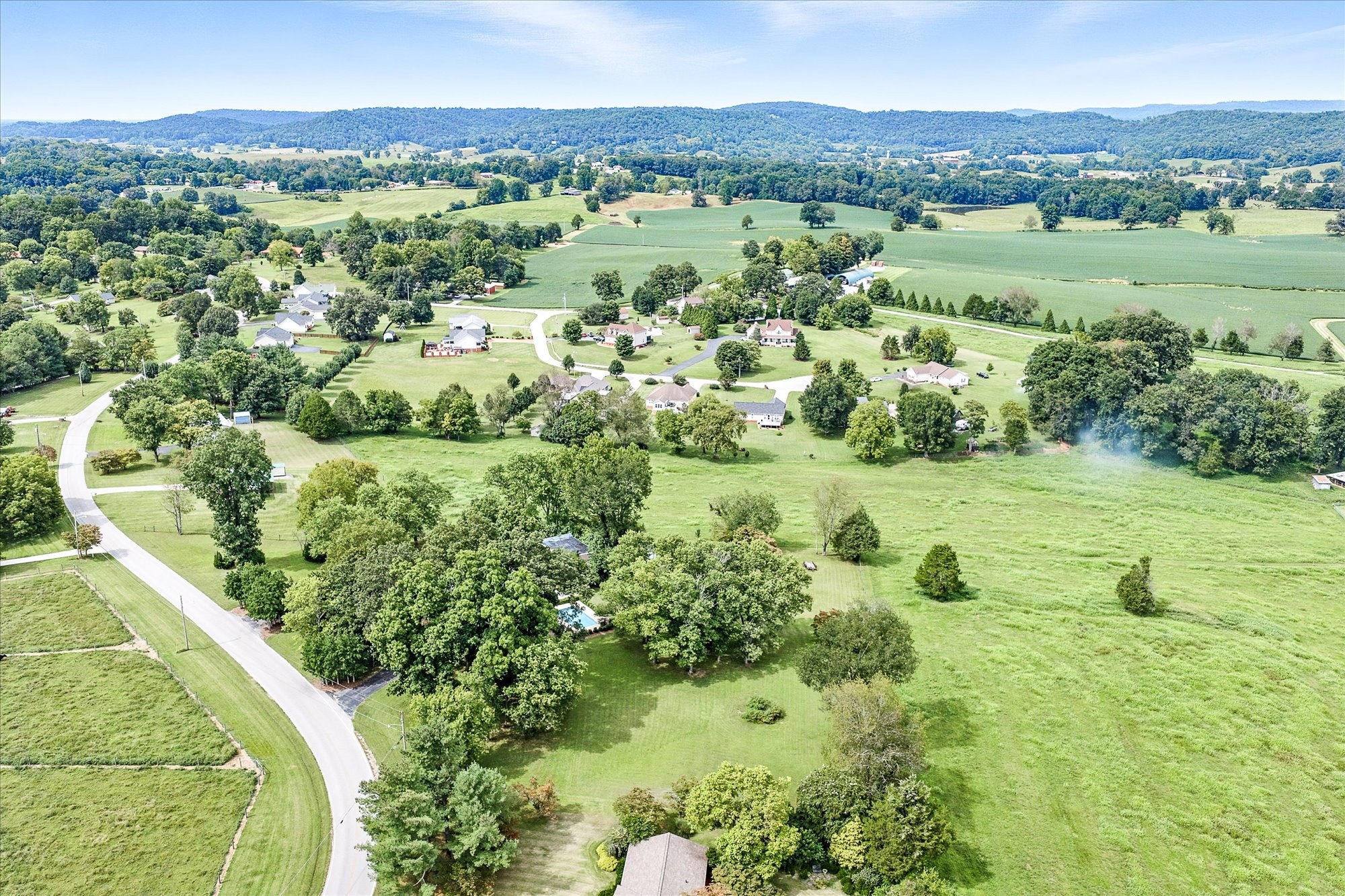 548 Turntable Road Sparta, TN 38583 - Photo 41 of 51 a view of a lush green forest with trees and houses